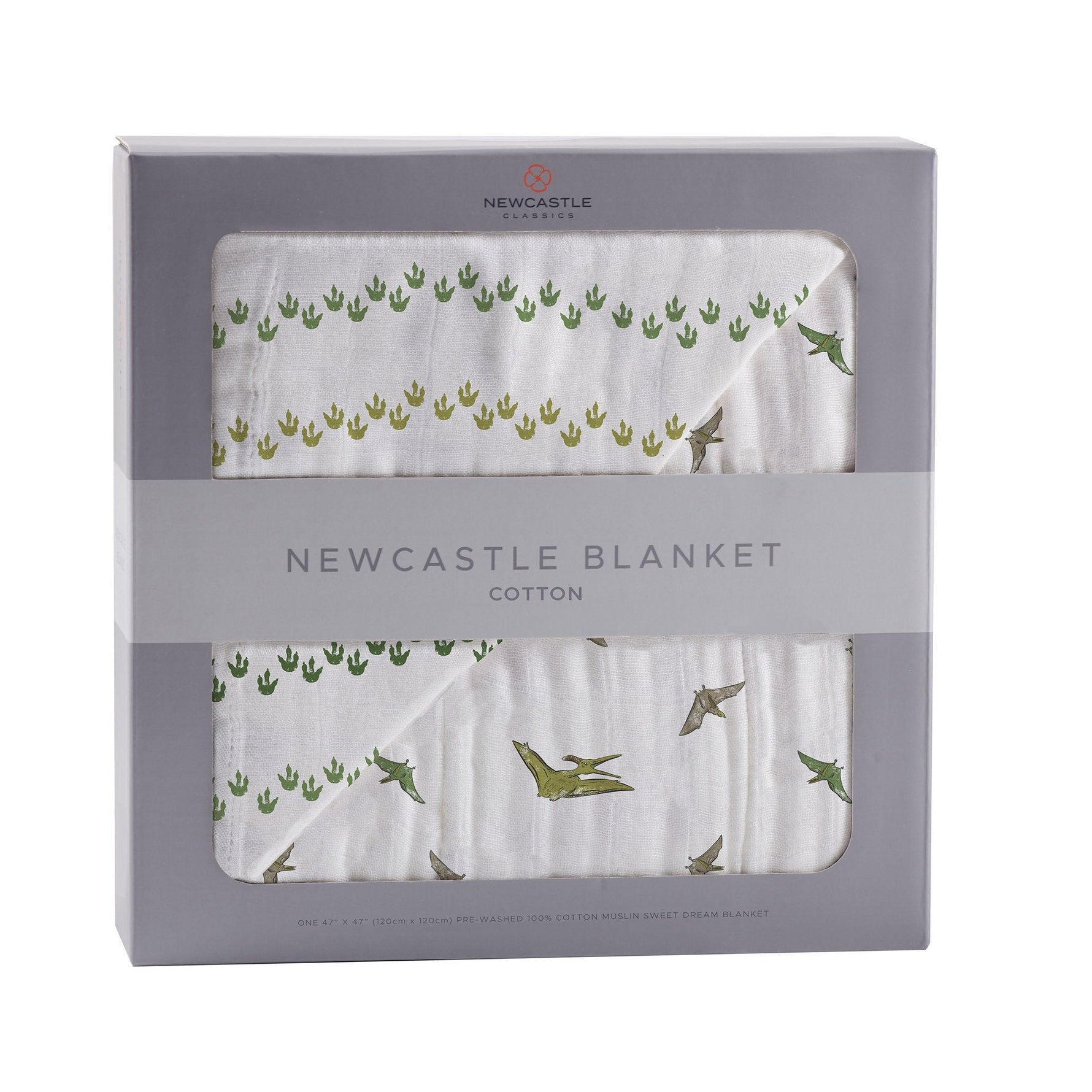 Cotton muslin baby blanket with dinosaur feet and pteranodon print in soft muted tones