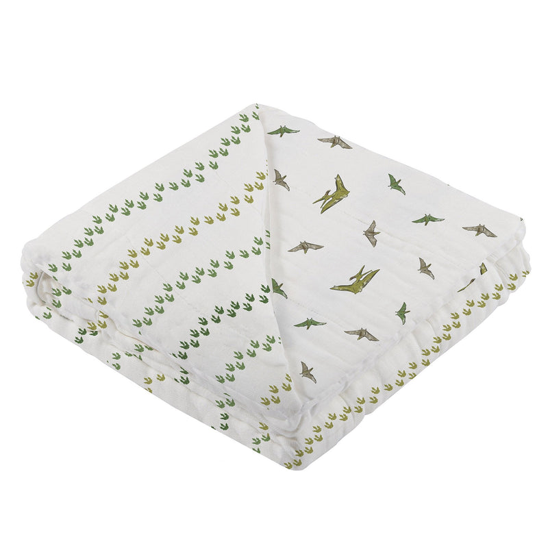 Dino Feet and Pteranodon cotton muslin blanket with green and brown dinosaur patterns.