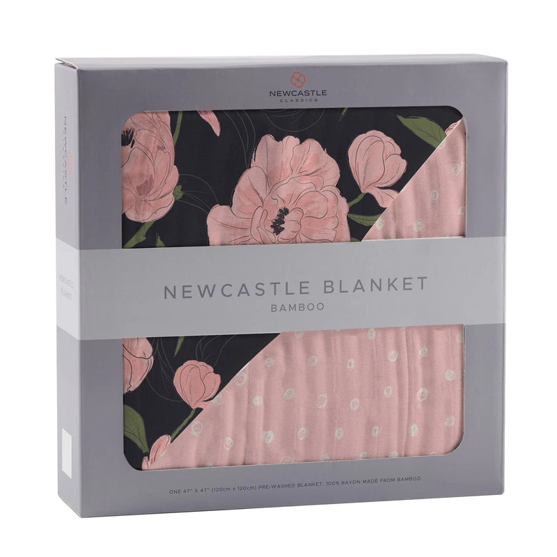 Peonies and Pearl Polka Dot Newcastle Blanket in natural bamboo muslin packaging.