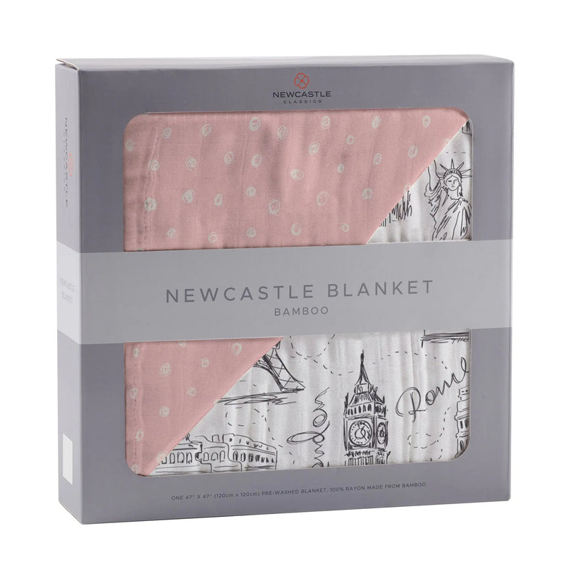 Pearl Polka Dot bamboo muslin kids blanket with city-themed design in packaging.