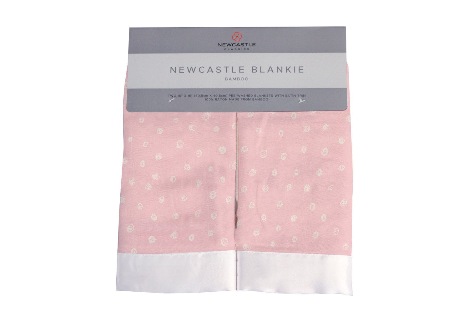 Pink bamboo muslin security blanket with a white polka dot pattern.