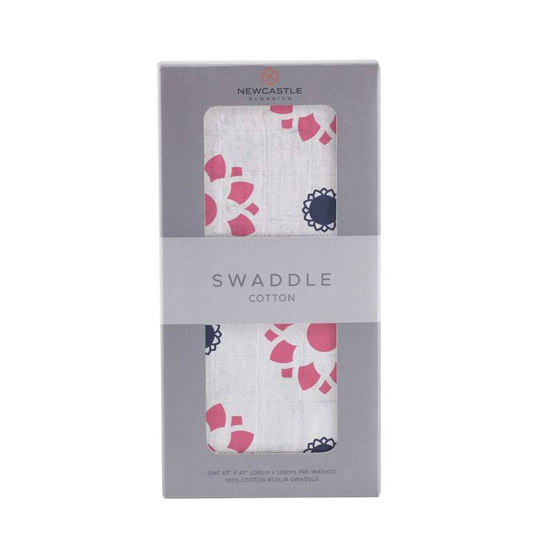 Primrose Indigo Cotton Muslin Swaddle packaging with floral pattern.