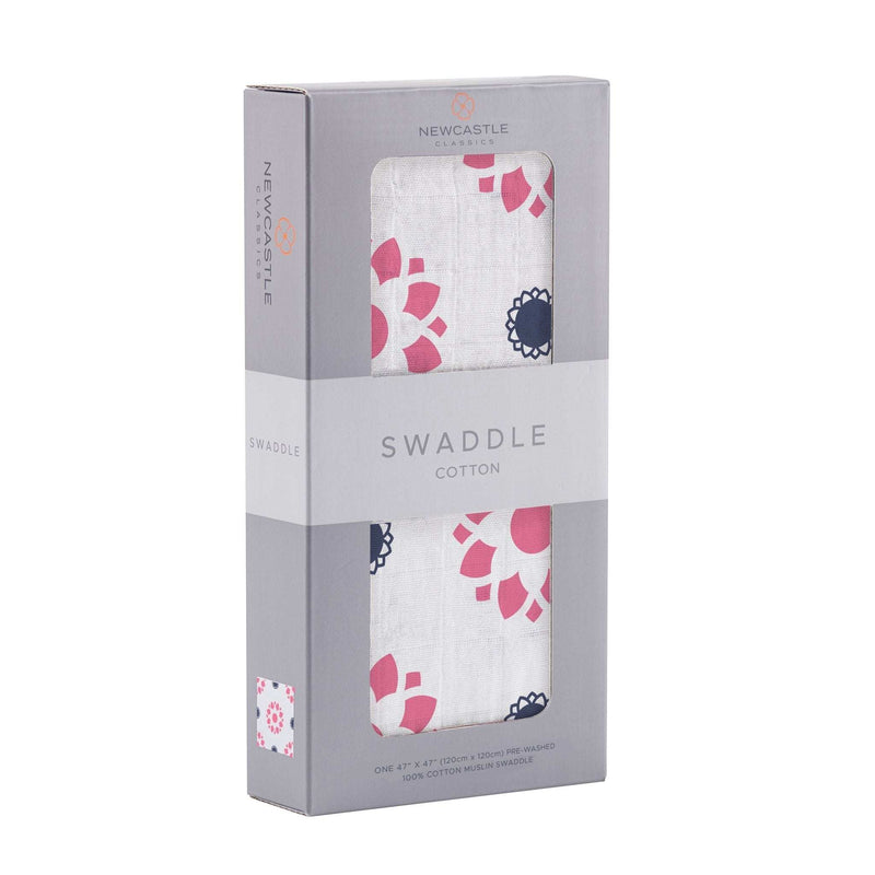Primrose Indigo Cotton Muslin Swaddle in packaging, soft breathable fabric.