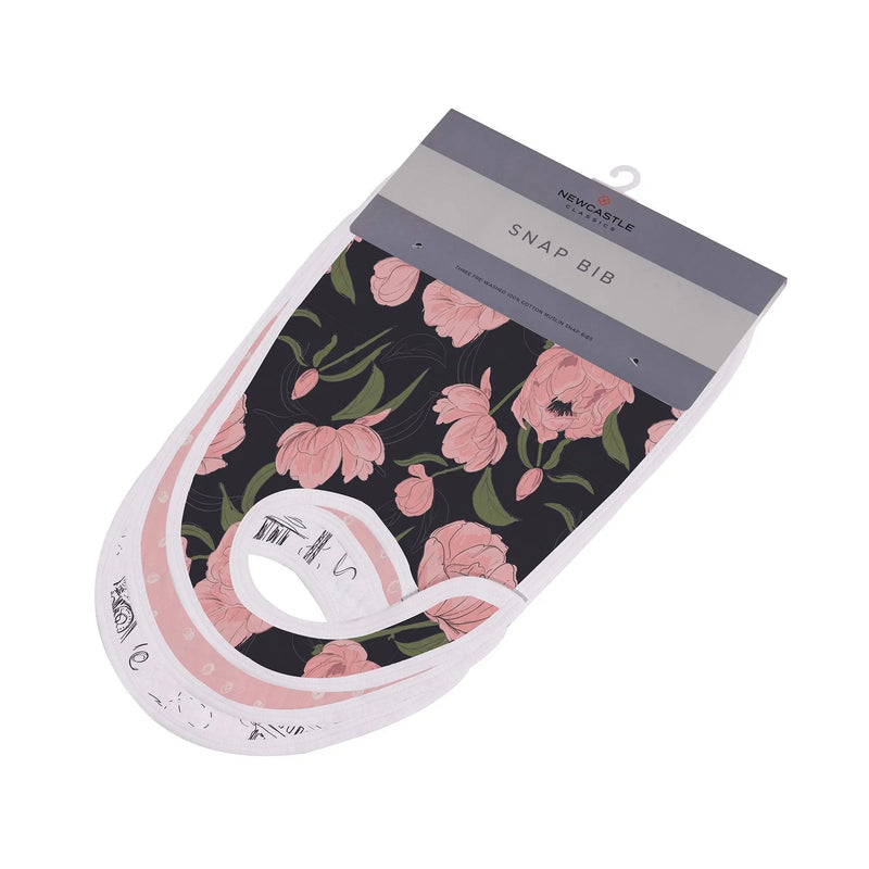 Bamboo muslin snap bibs with floral design, featuring three front snaps for adjustable fit.