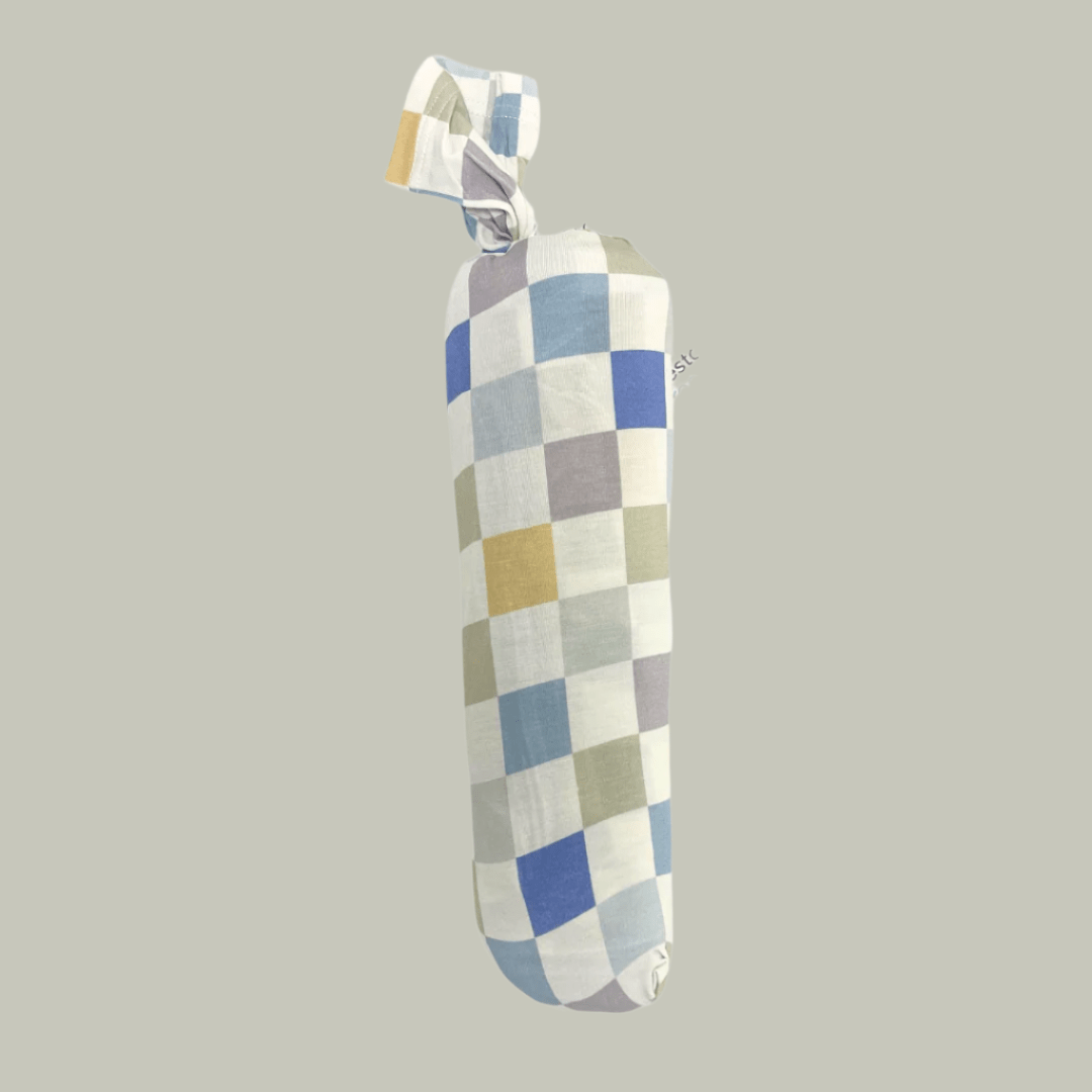 Skye Checks swaddle blanket with a soft checked pattern in cool tones, laid out flat.