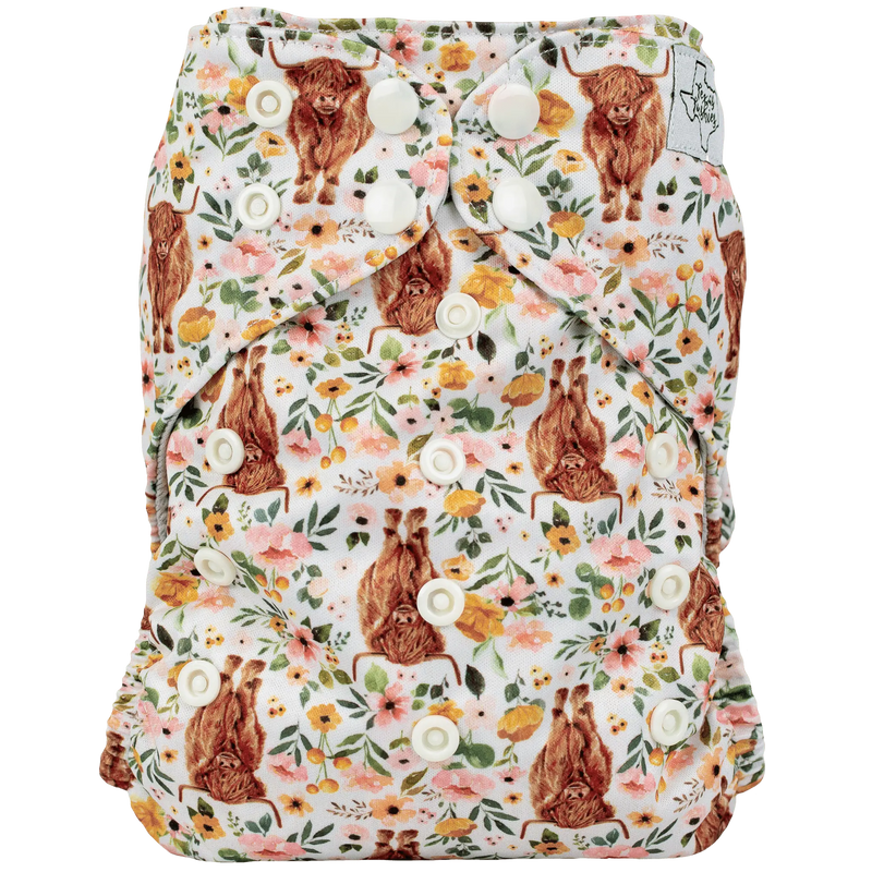 Slim Fit Pocket Cloth Diaper with floral and animal print, featuring adjustable snaps for custom fit.