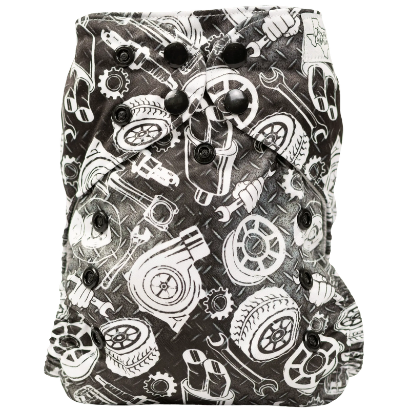 Slim Fit AIO Cloth Diaper with black and white gear pattern, adjustable snaps, and athletic wicking jersey.