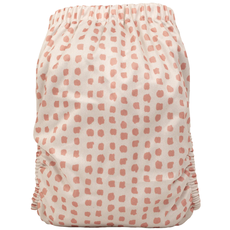 Slim Fit AIO Cloth Diaper with pink dot pattern, designed for 8-40lbs, featuring athletic wicking jersey and tummy panels.