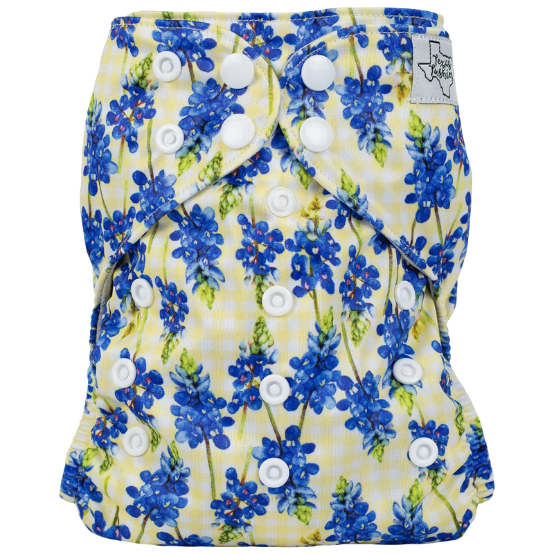 Slim Fit Pocket Cloth Diaper with blue floral design and adjustable snaps.