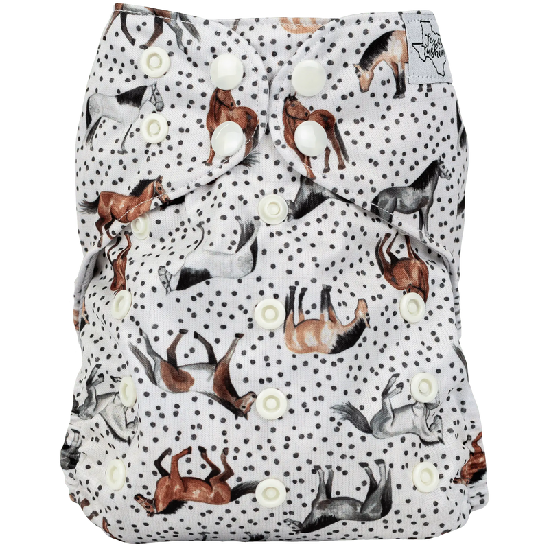 Slim Fit AIO Cloth Diaper with horse and polka dot print, easy snap closure.