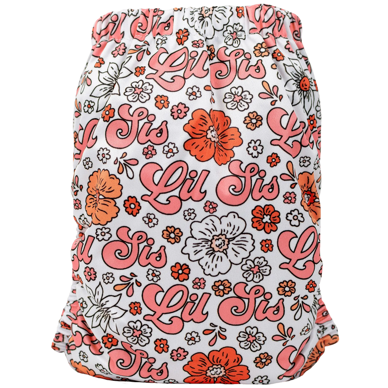 Slim Fit AIO Cloth Diaper with floral and neon design, suitable for babies 8-40 lbs.