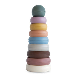 Stacking rings toy with a set of graduated rings in muted colors on a central post base.
