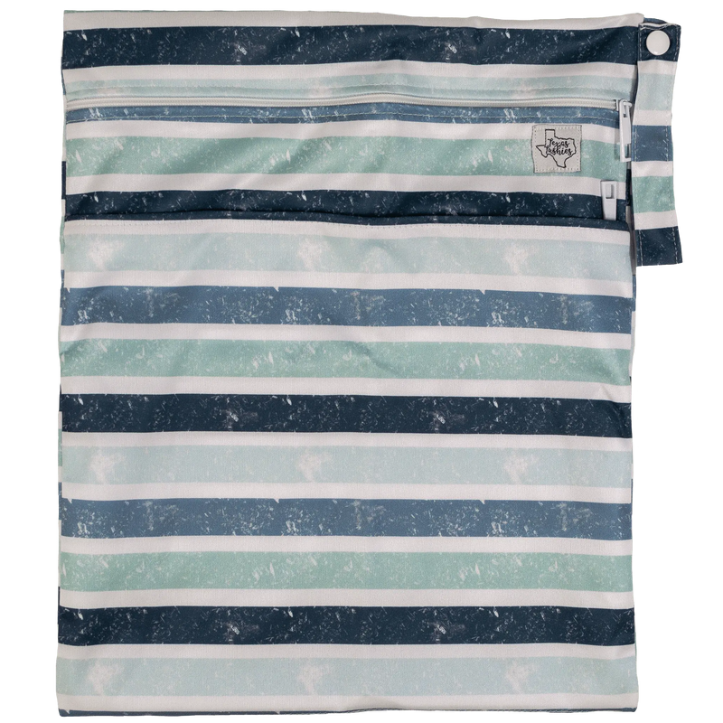 Texas Tushies Wet/Dry bag with striped design, double zipper, and strap.