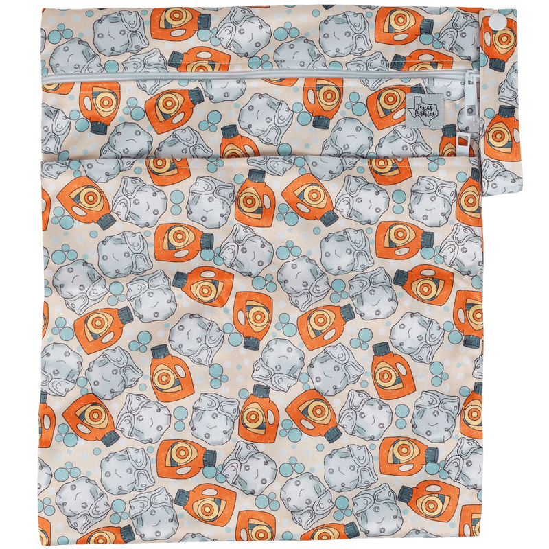 Texas Tushies Wet/Dry Bag with double zipper and colorful pattern, suitable for cloth diapers.