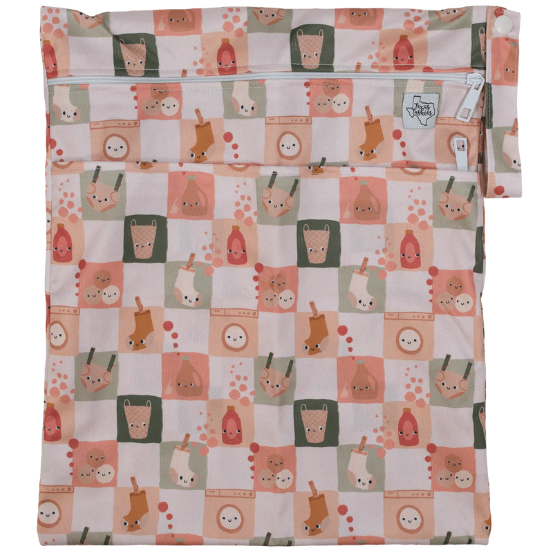 Texas Tushies Wet/Dry Bag with animal pattern, double zipper, and strap, 12x16 inches.