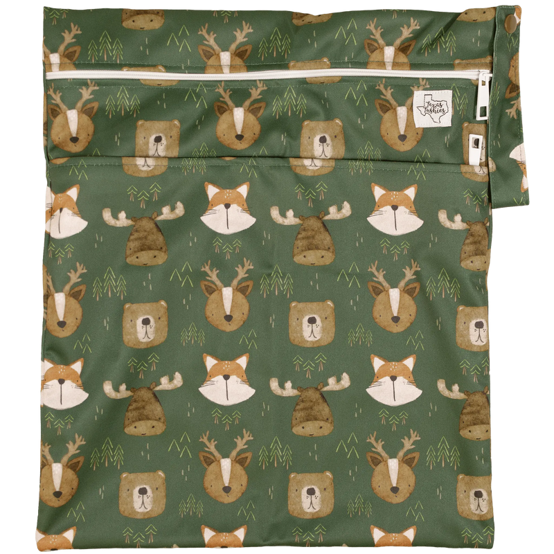 Texas Tushies Wet/Dry Bag with animal pattern, dual compartments, and strap.