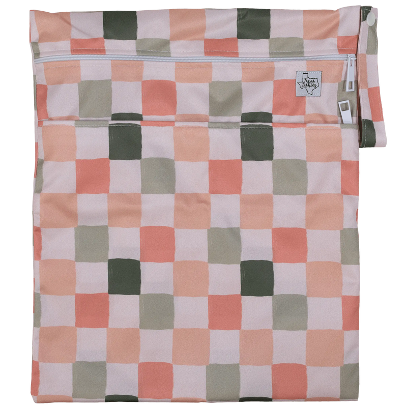 Texas Tushies Wet/Dry Bag with checkered design, dual compartments, and strap, 12x16 inches, water-resistant.