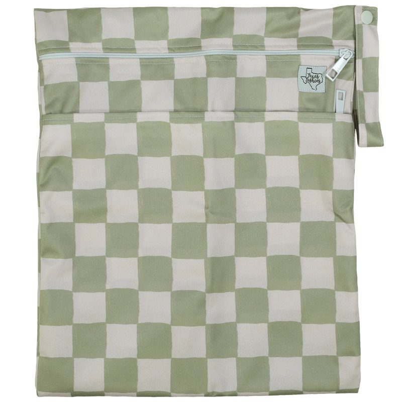 Texas Tushies Standard Wet/Dry Bag with green and white checkered pattern and strap.