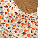 Square baby swaddle blanket with a sports-themed star player pattern