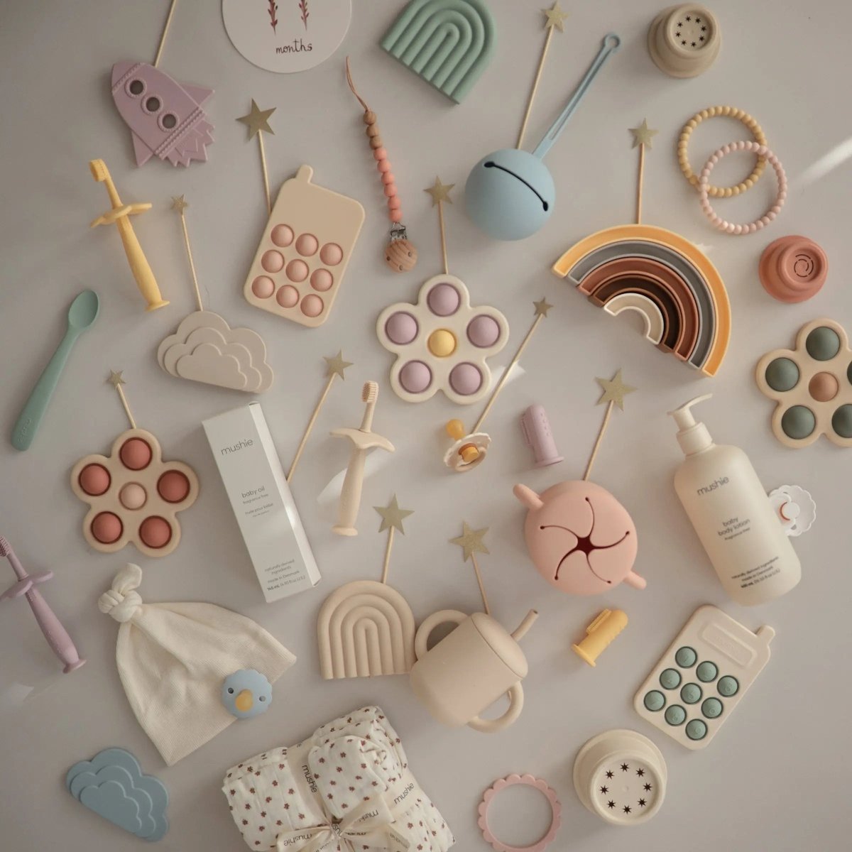 Mushie Star Training Toothbrush for Kids with Soft Silicone Bristles and Gentle Gum Care - Everetts Place Boutique - 