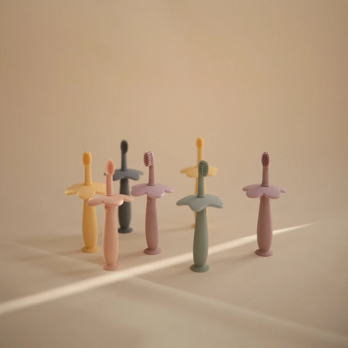 Mushie Star Training Toothbrush for Kids with Soft Silicone Bristles and Gentle Gum Care - Everetts Place Boutique - 