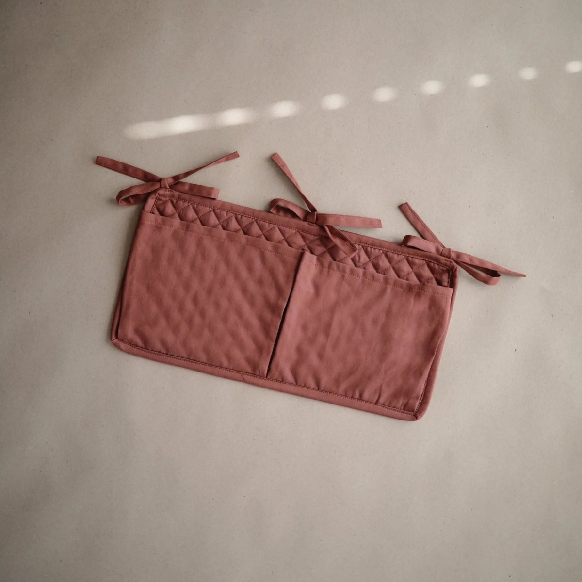 Mushie Storage Pocket for Baby Essentials with Adjustable Ribbon Ties - Everetts Place Boutique - 