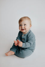 Three Little Tots Storm Blue Baby Ribbed Playsuit with pockets - 