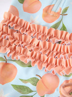 Rylee Faith Designs Summer Peach Girl Long Sleeve Ruffle One Piece SwimsuitEveretts Place