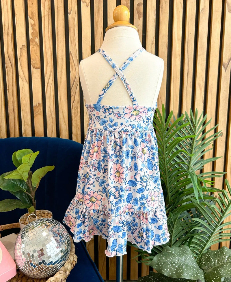 Floral Summer Ruffle Dress on display mannequin.