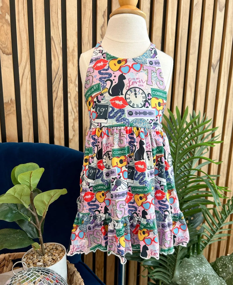 Summer Ruffle Dress with vibrant printed design displayed on mannequin.