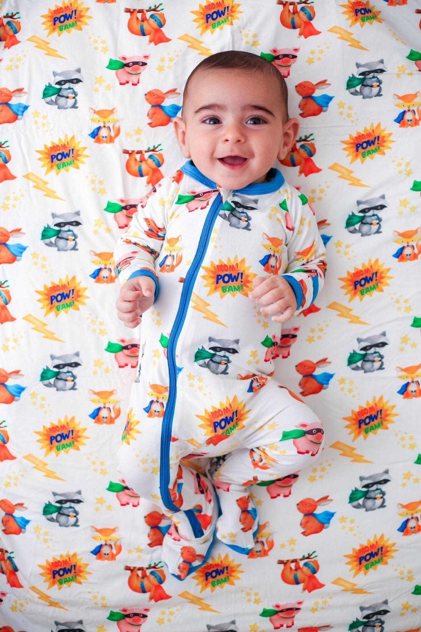 Baby footie pajamas with a two-way front zipper running from neckline to the covered feet.