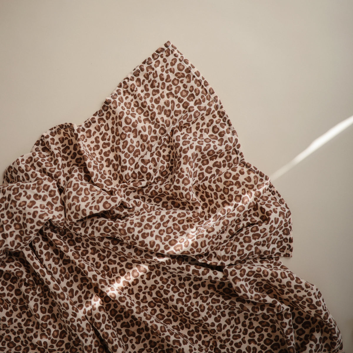 Mushie organic cotton muslin swaddle blanket
