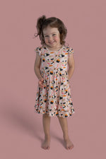 DREAM BIG LITTLE CO SWEET PEA SUSHI DREAM RUFFLE DRESSEveretts Place