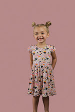 DREAM BIG LITTLE CO SWEET PEA SUSHI DREAM RUFFLE DRESSEveretts Place