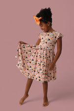DREAM BIG LITTLE CO SWEET PEA SUSHI DREAM RUFFLE DRESSEveretts Place