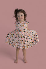 DREAM BIG LITTLE CO SWEET PEA SUSHI DREAM RUFFLE DRESSEveretts Place