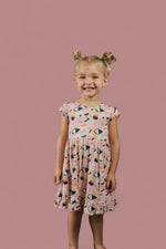 DREAM BIG LITTLE CO SWEET PEA SUSHI DREAM RUFFLE DRESSEveretts Place
