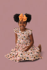 DREAM BIG LITTLE CO SWEET PEA SUSHI DREAM RUFFLE DRESSEveretts Place