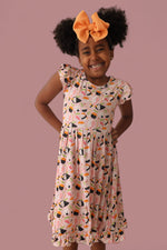 DREAM BIG LITTLE CO SWEET PEA SUSHI DREAM RUFFLE DRESSEveretts Place