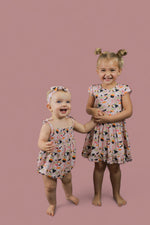 DREAM BIG LITTLE CO SWEET PEA SUSHI DREAM RUFFLE DRESSEveretts Place