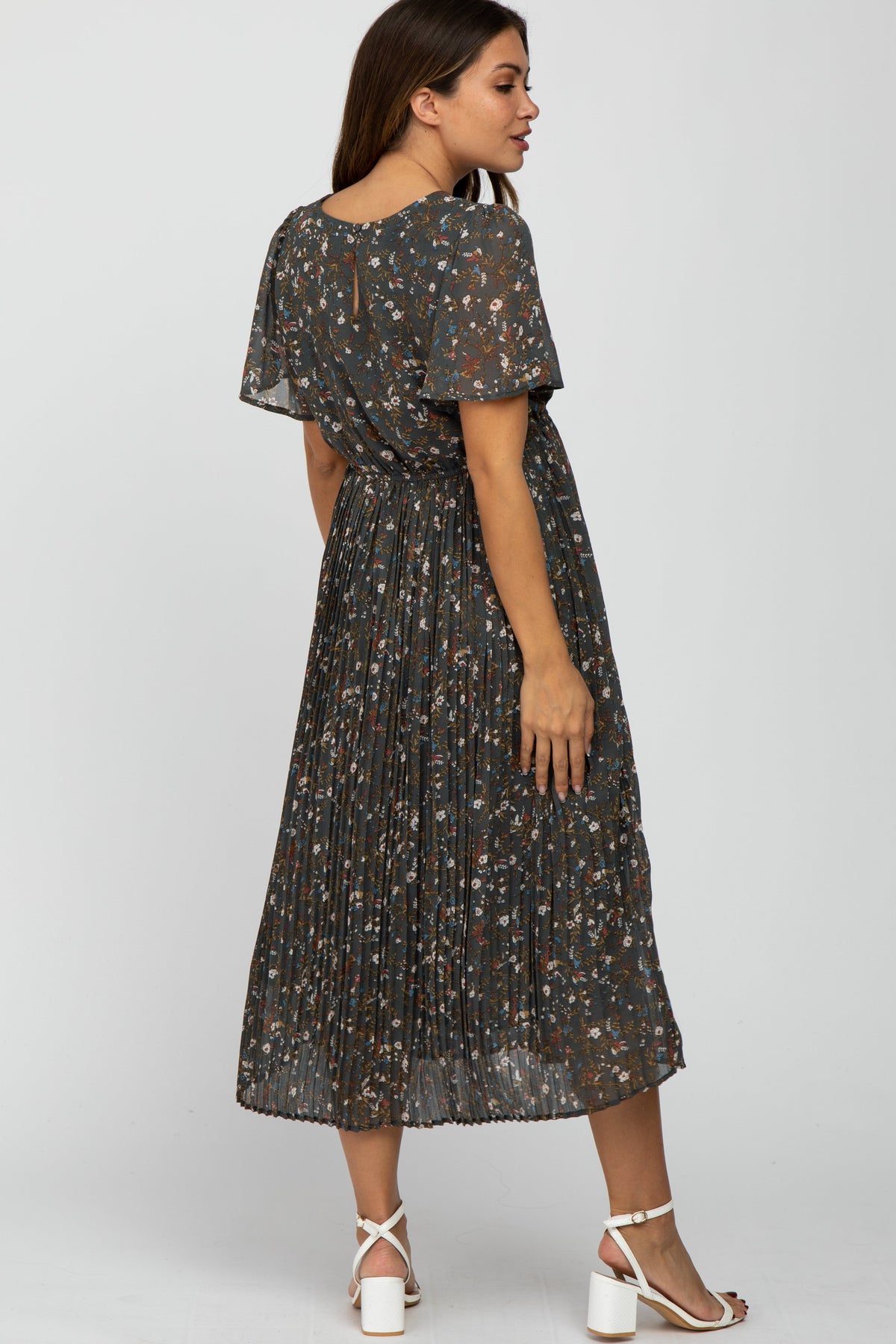 PinkBlush Teal Floral Pleated Chiffon Maternity Midi Dress on a pregnant model