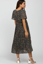 PinkBlush Teal Floral Pleated Chiffon Maternity Midi Dress on a pregnant model