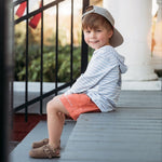 Pair of Little Love Bug Co. The Beck tan leather baby sandals for infants and toddlers.