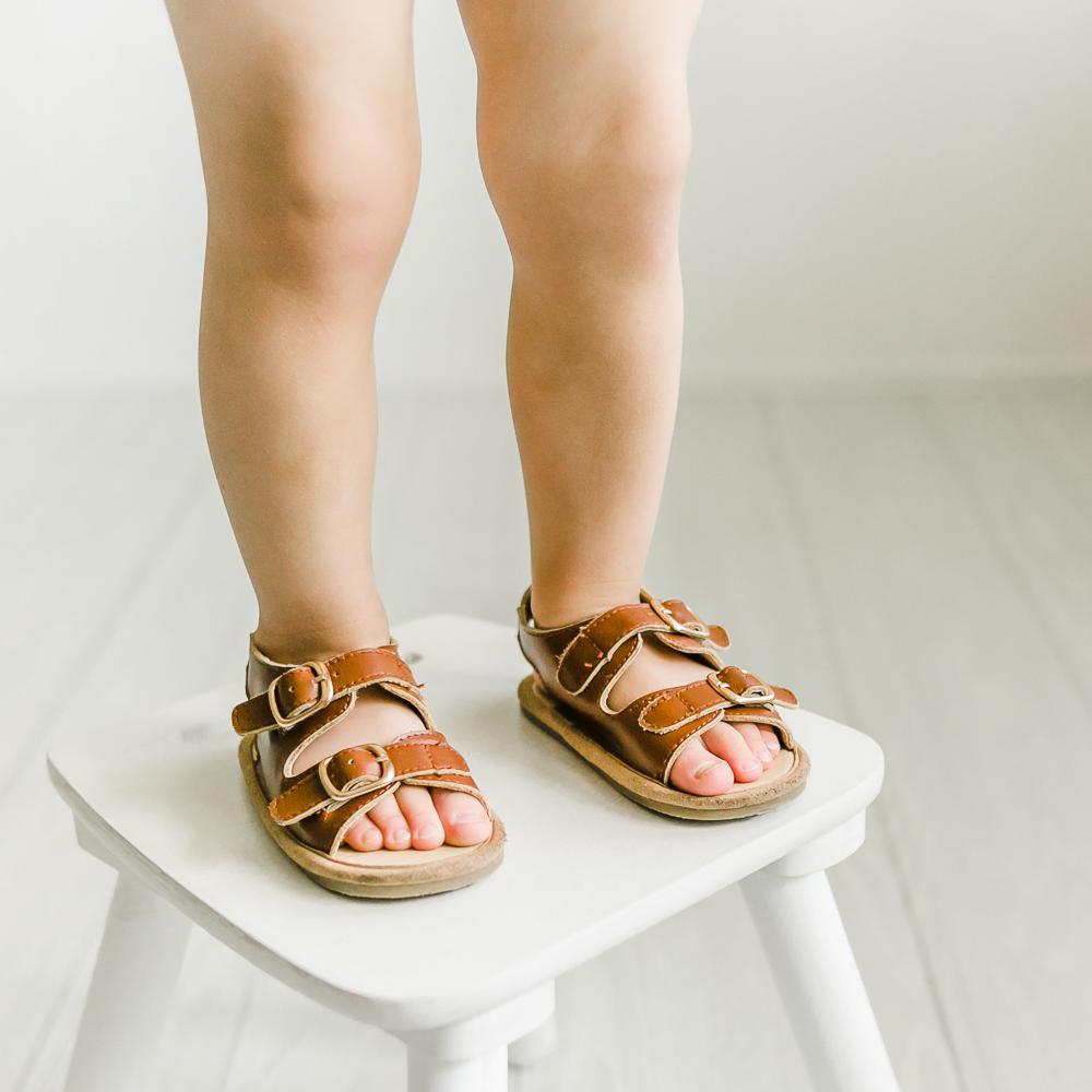 Little Love Bug Co. The Charley tan leather soft sole baby moccasins.