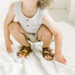 Little Love Bug Co. Charley tan leather baby moccasins.