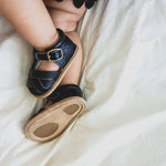 Little Love Bug Co. baby closed toe sandals.