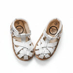 Little Love Bug Co. baby closed toe leather sandal.