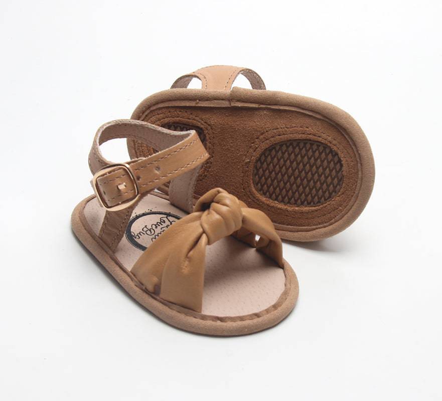 Little Love Bug Co. The Hazel organic baby moccasins in hazelnut brown.