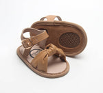 Little Love Bug Co. The Hazel organic baby moccasins in hazelnut brown.