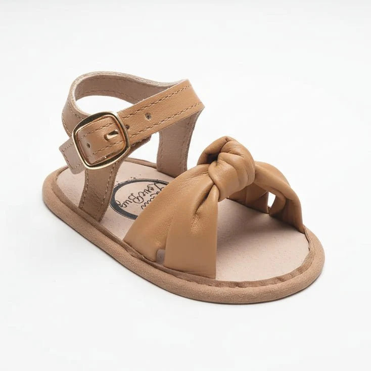 Little Love Bug Co. The Hazel leather baby moccasins in tan.